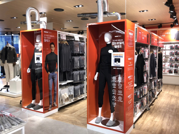 ‘친환경 입는 보일러’라는 콘셉트로 웜테크 신제품이 경동나비엔 보일러 디자인과 함께 전시돼 있다. / 사진=스파오