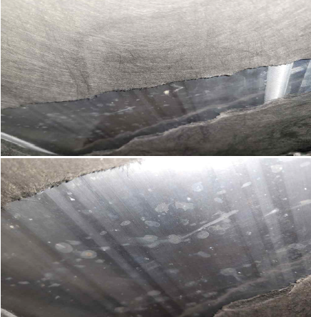 벤츠 전기차 하부에서 촬영된 배터리 팩. 부직포를 떼어내면 바로 배터리 팩이 노출된다. 차주들은 테슬라 전기차와는 달리 방탄이 되는 수준(Ballistic Grade)의 하부 쉴드가 결여되어 있고, 배터리팩 하부도 도로의 장애물과의 충격으로부터 배터리 셀을 보호하지 못하는 재질 및 구조로 돼 있어 결함에 해당한다고 지적한다. / 사진=법률사무소 나루 제공