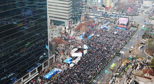 지난 21일 서울 종로구 광화문 동화면세점 앞에서 열린 집회 모습. / 사진=연합뉴스